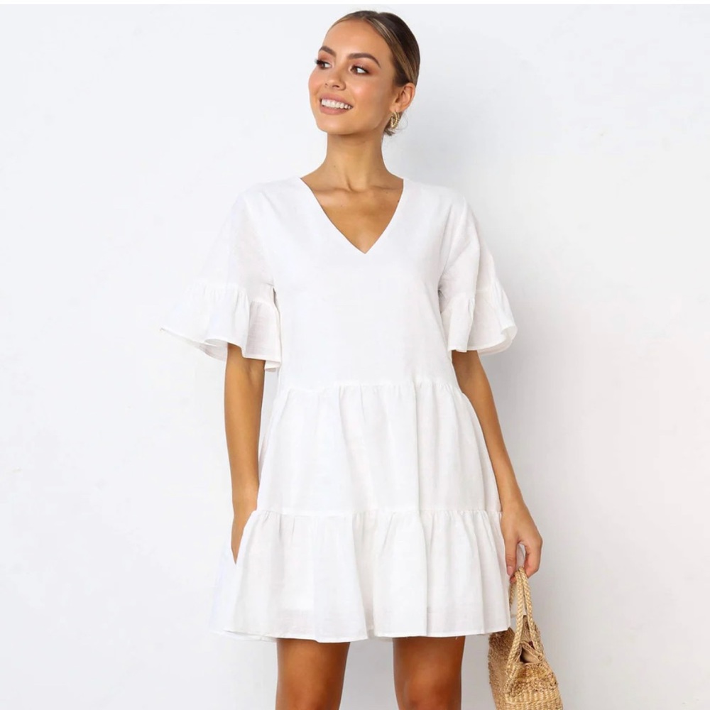 FANCYINN New York and London Bell Sleeve Ruffle Hem V-Neck Swing Dress